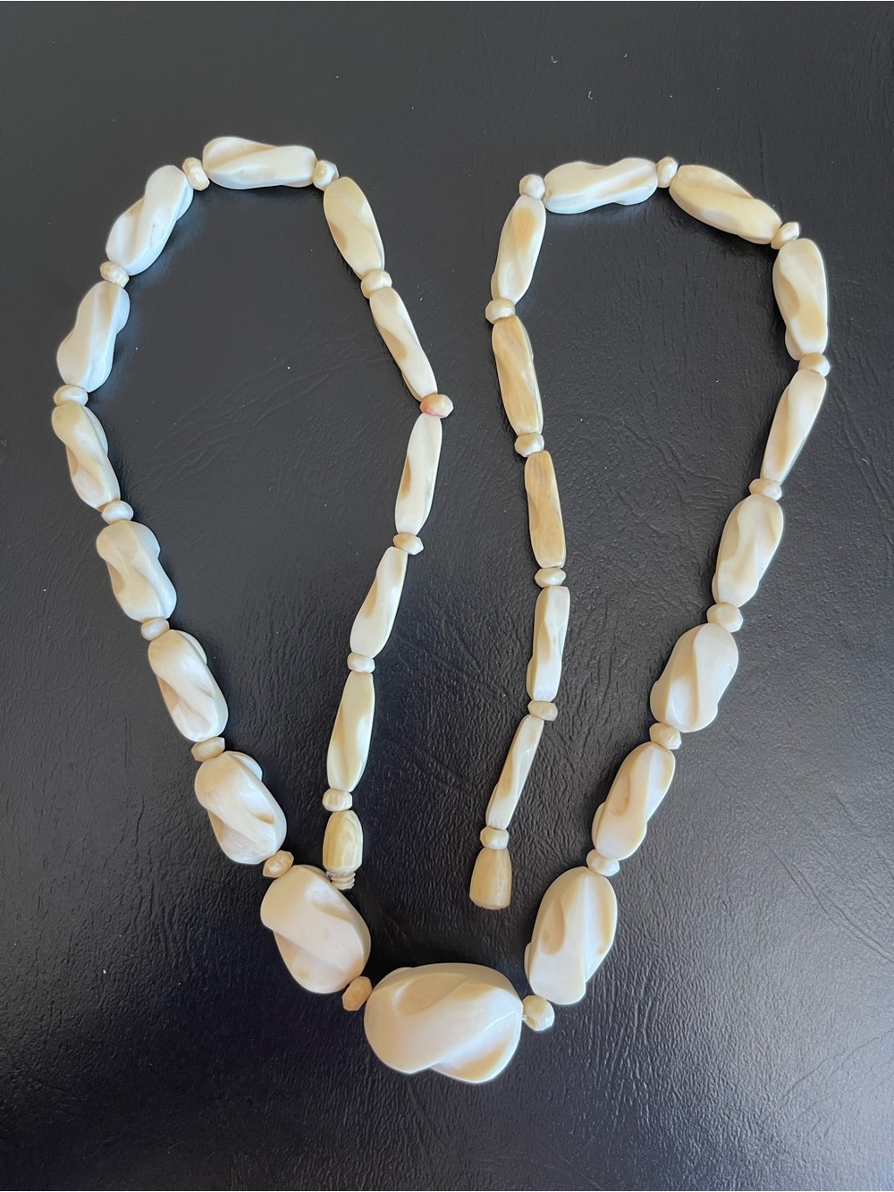 Antique or vintage hand carved Ivory beaded necklace.